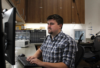 PhD Student Caden Hamrick works at a lab computer